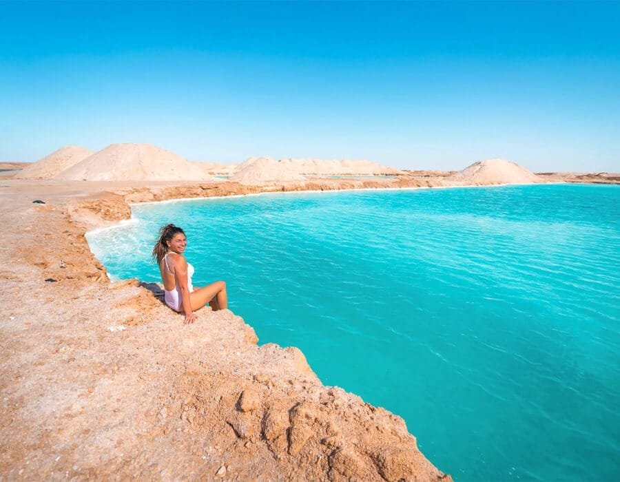 A wonderful picture of a woman in Siwa salt marshes